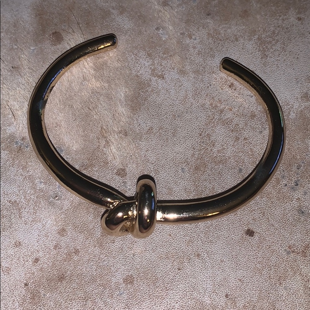 Goldtone knot cuff bracelet